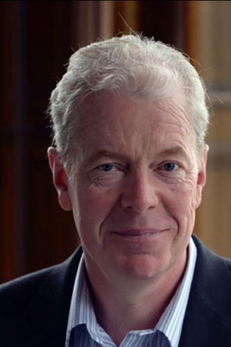 Head and shoulders portrait of Simon Newman
