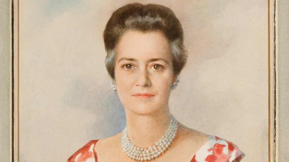 oil on canvas portrait of an adult with a red and white flowered off shoulder blouse wearing a jeweled necklace and with grey streaks at their temples