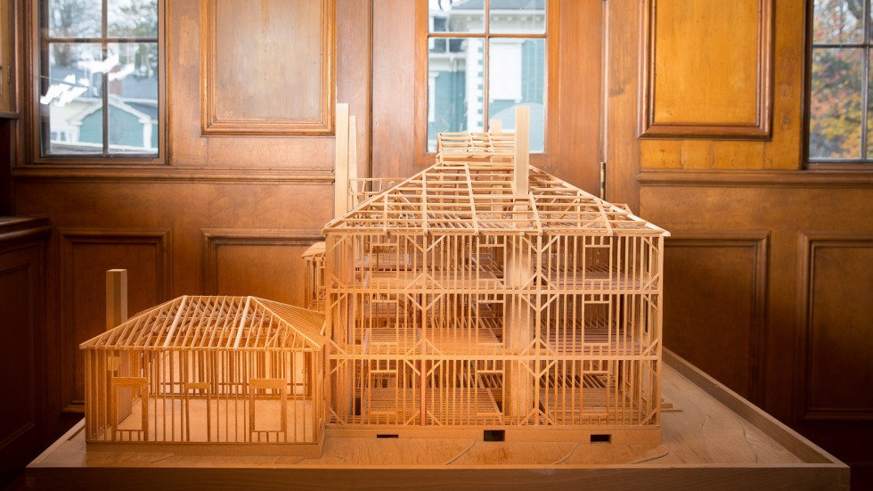 small wooden model of a victorian house